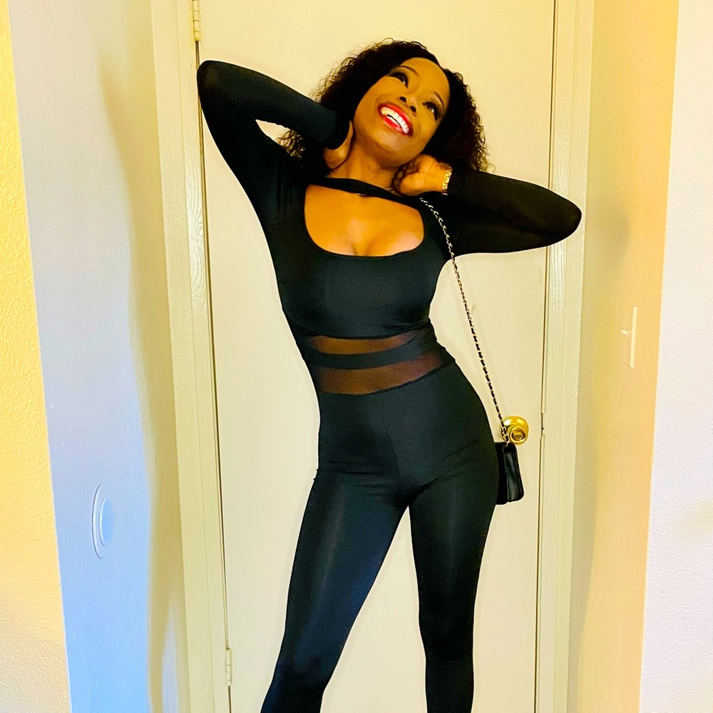 Black mesh and cut out jumpsuit